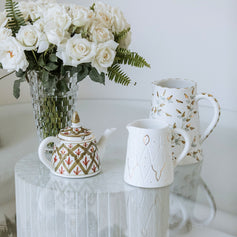 TEAPOTS AND DECANTERS