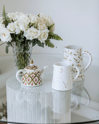 TEAPOTS AND DECANTERS